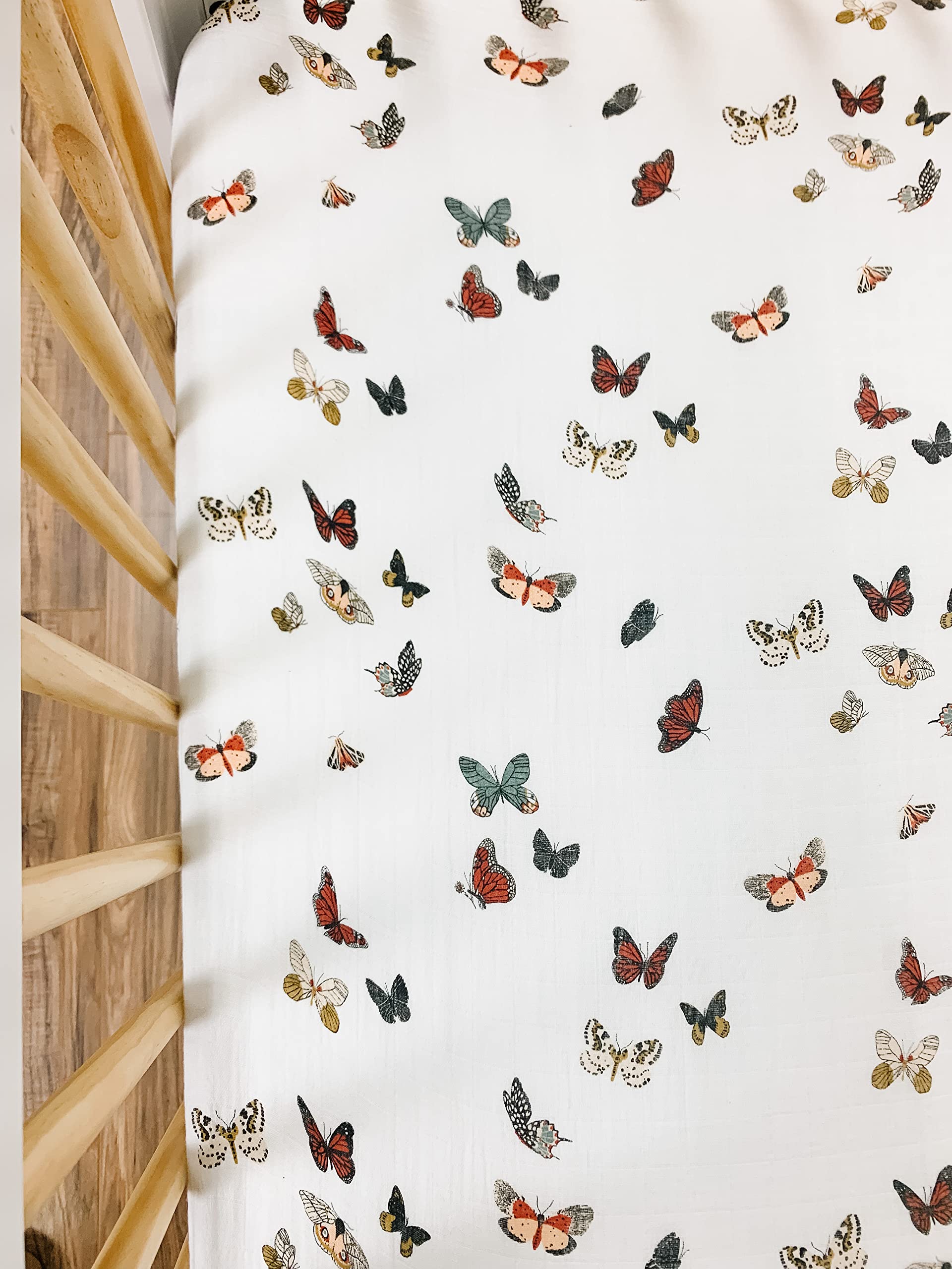 Clementine Kids crib sheet being machine washed for quick cleanup