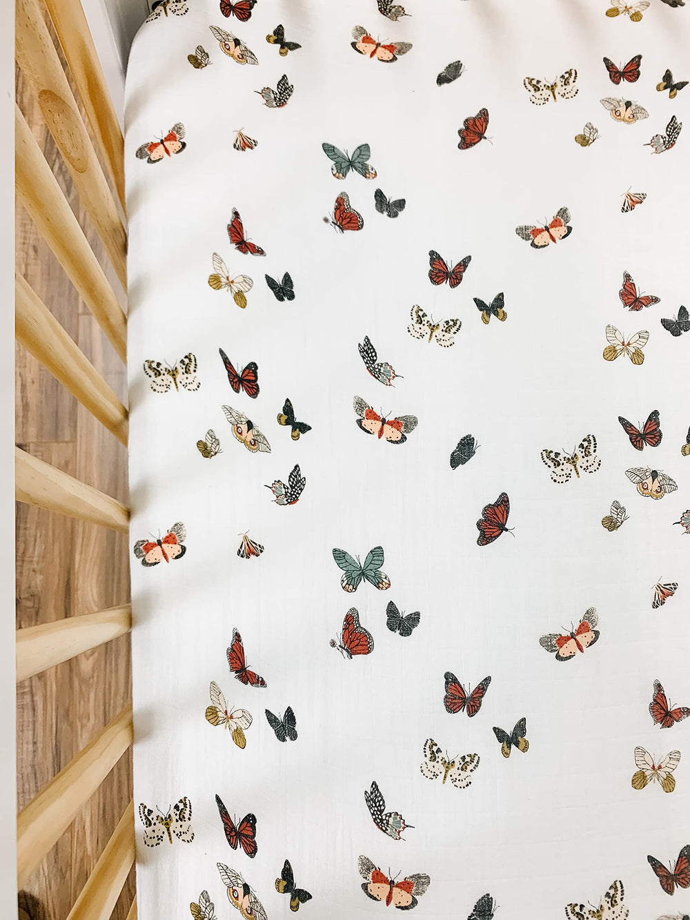 Clementine Kids crib sheet being machine washed for quick cleanup