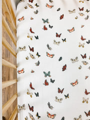 Clementine Kids crib sheet being machine washed for quick cleanup