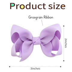 Clipband baby girl wearing a 3-inch hair bow for a comfy daily look