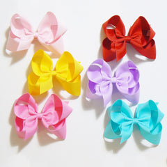 Clipband bows wearability close-up demonstrating comfortable fit for all-day wear.