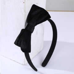 Clipband 4-inch velvet hair bows in black for secure toddler styling.