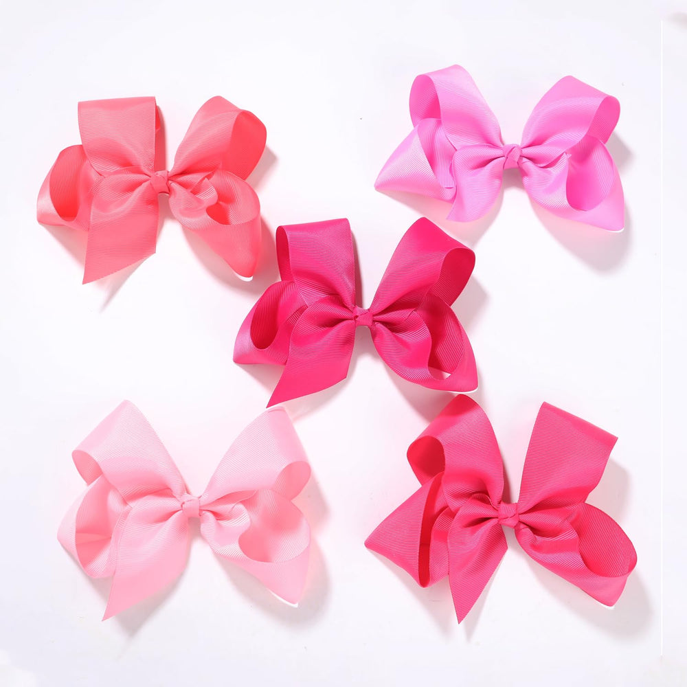 Clipband handmade bows closeup shows sturdy alligator clips for secure styling.
