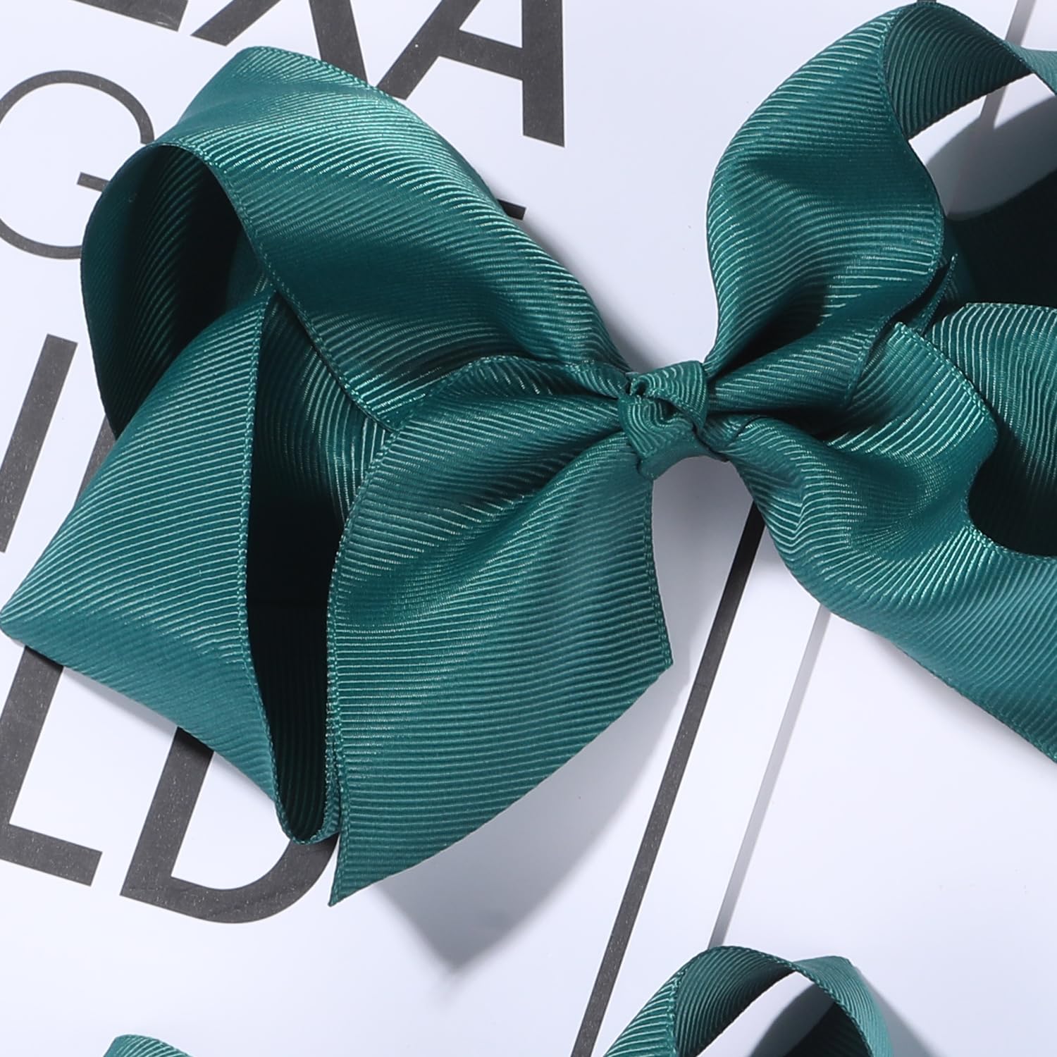 Clipband Hunter Green Bows close-up shows handmade grosgrain ribbons and durable clips.