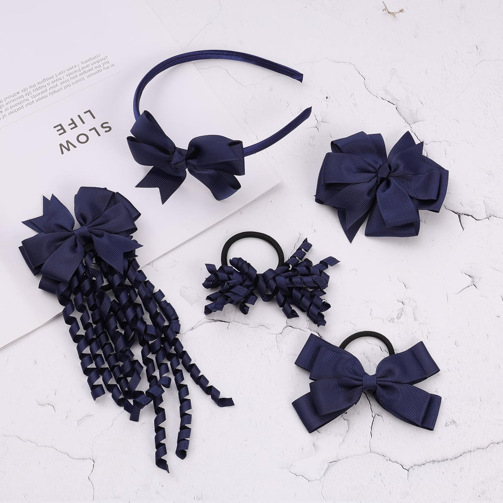 Clipband navy pom-pom hair ties add playful accents and secure holds.