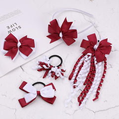 Clipband pom-pom hair ties offer gentle grip for toddlers.