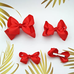 Clipband Red Bows grosgrain closeup showing sturdy clips for quick styling.