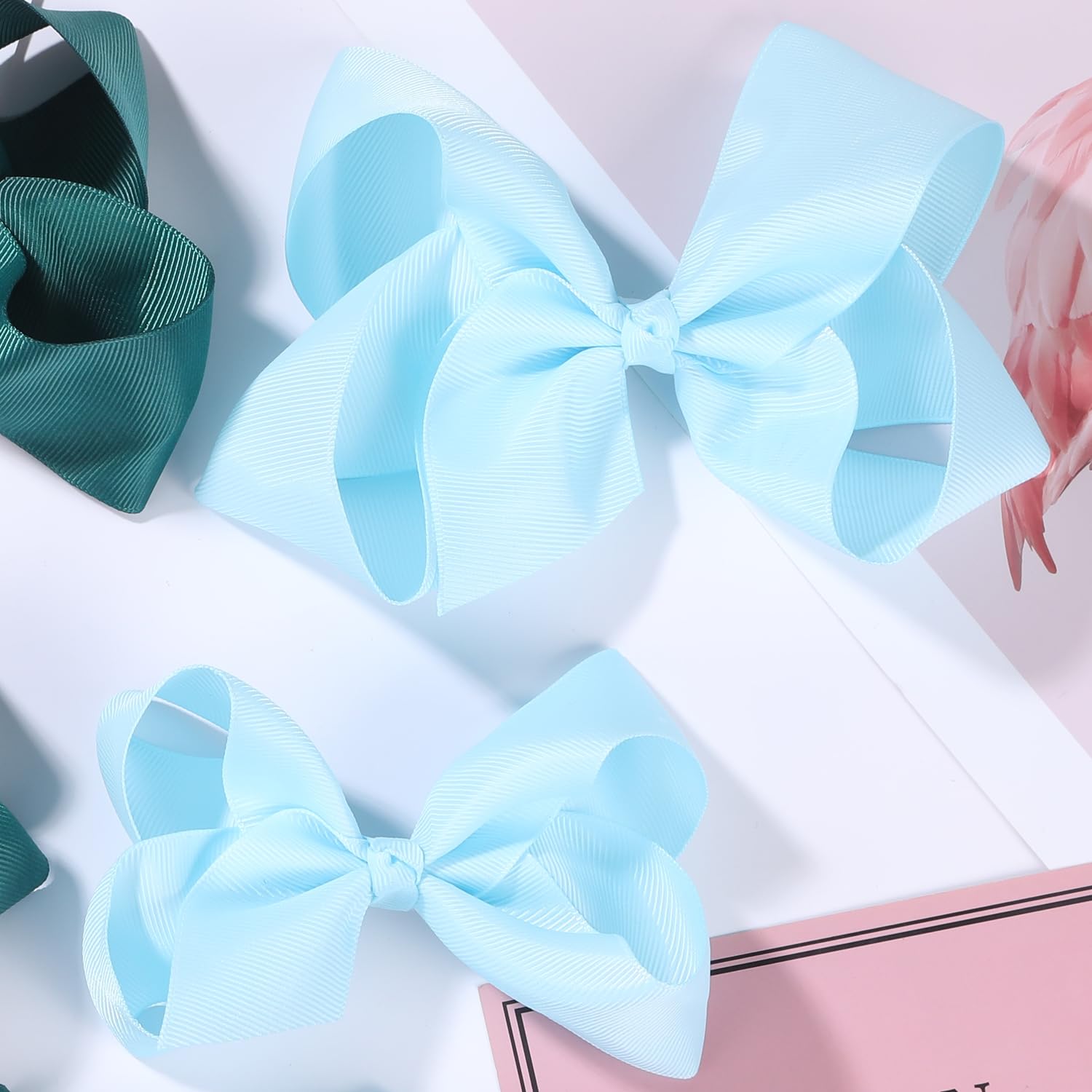 Clipband Sky Blue Bows closeup shows handmade grosgrain texture.