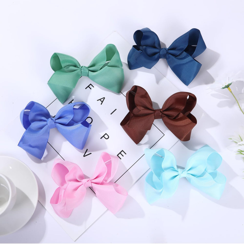 Clipband solid-color bows pack ready for outfits and gift-giving occasions.
