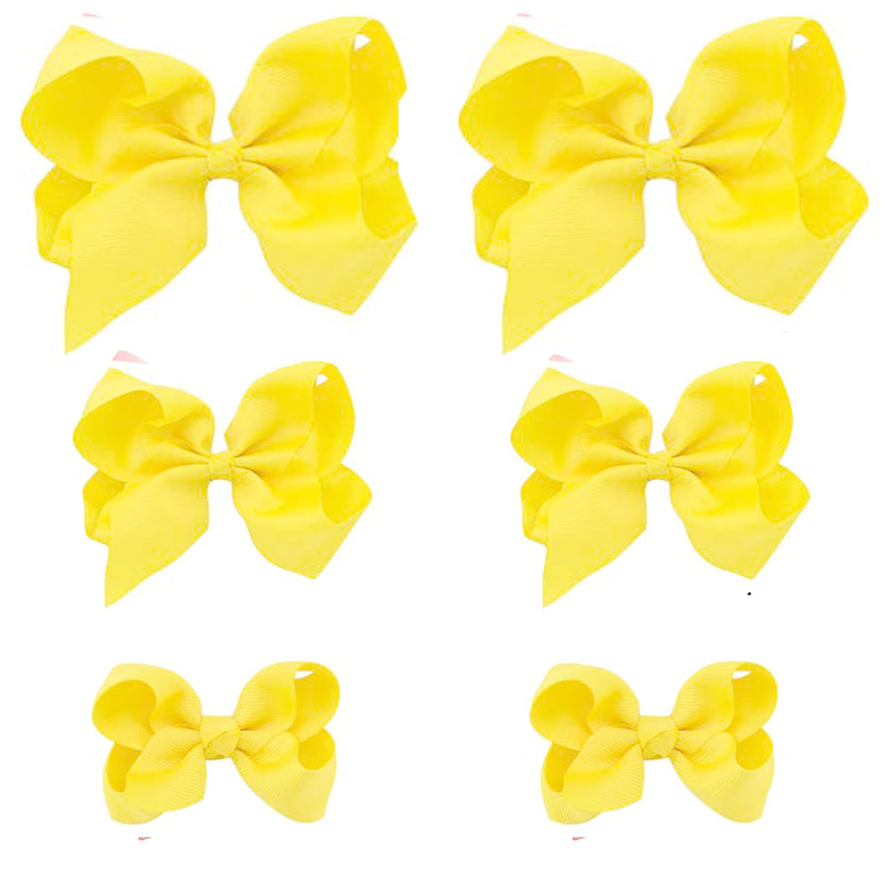 Clipband Yellow Bows 6-pack on white background for vibrant kids’ hairstyles.