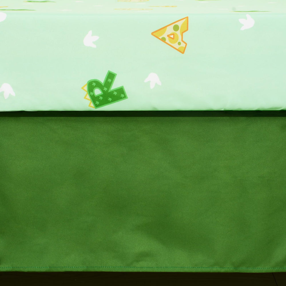 Cloele dinosaur crib bedding as a thoughtful baby shower gift