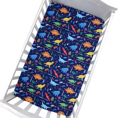 Cloele dinosaur fitted crib sheet fabric closeup shows soft, breathable polyester