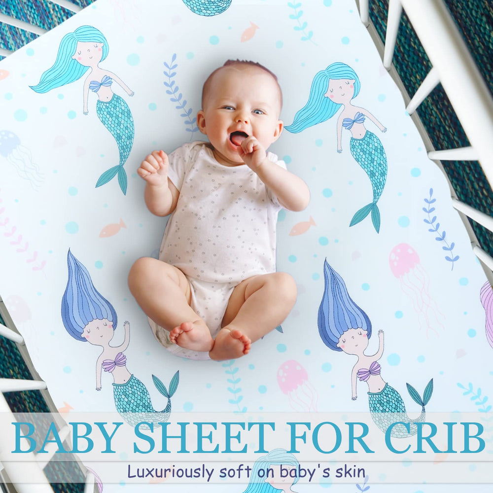 Close-up of Cloele mermaids crib sheet highlighting soft polyester texture