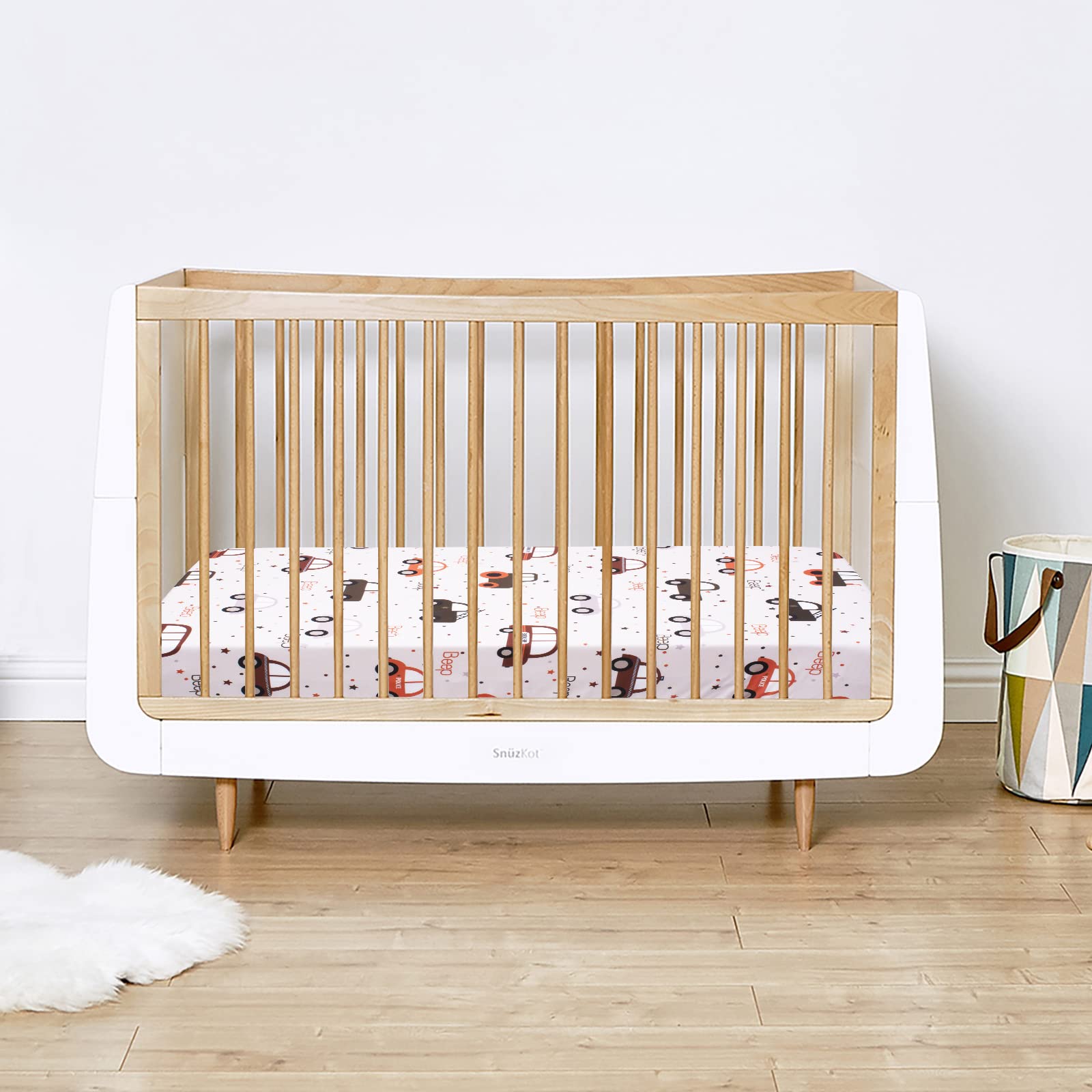 Cloele brown car pattern on crib sheet enhances gender neutral nursery decor