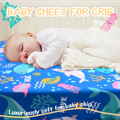 Cloele Ocean Fitted Crib Sheet Whale Design creates lively nursery vibes.