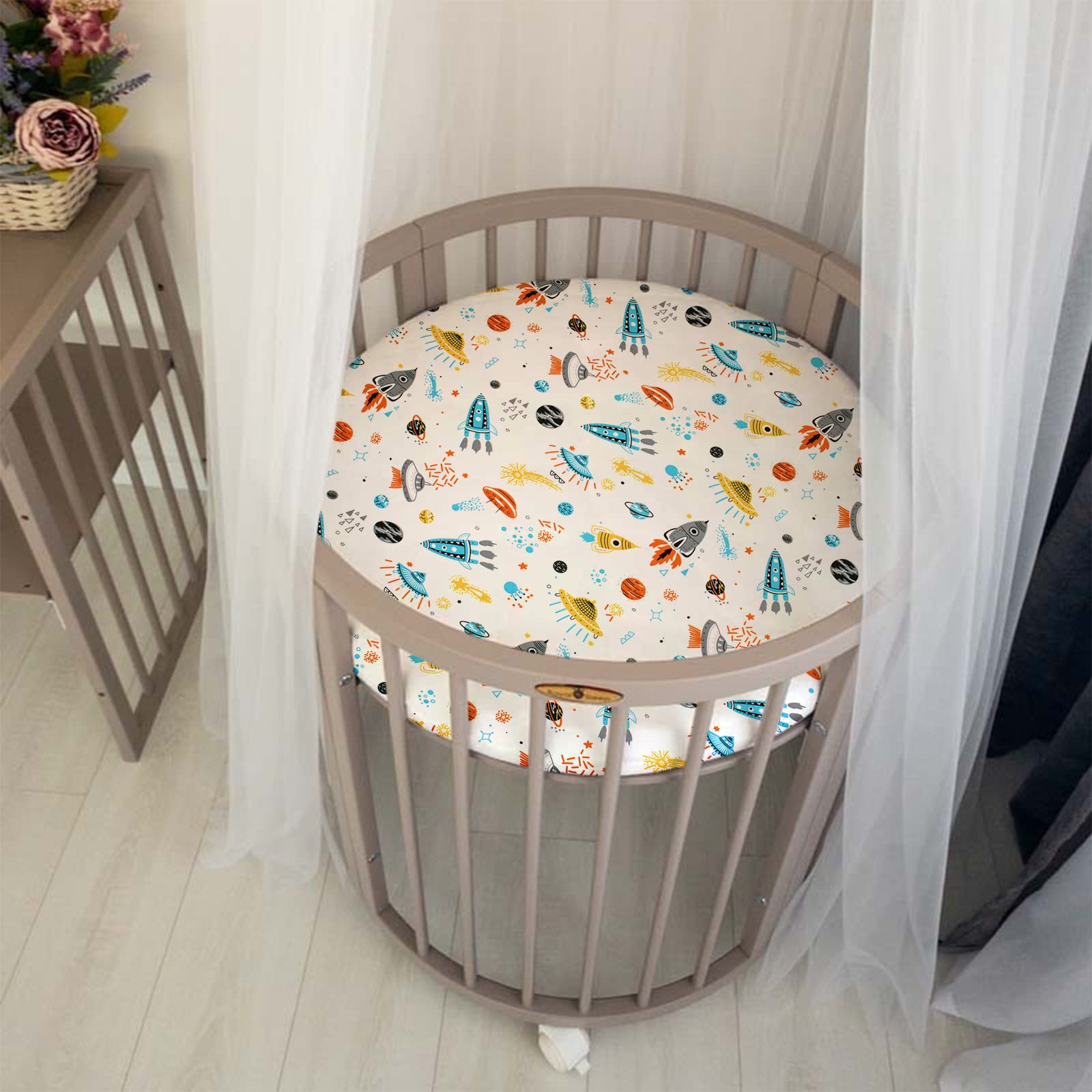 Cloele round stretchy crib sheet baby-in-crib demonstrates cozy surface