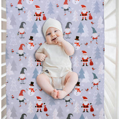 Cloele Snowman grey fitted crib sheet on bed showing cozy fit