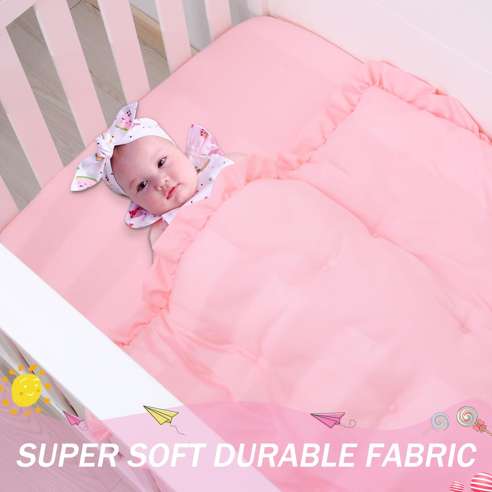 Cloele solid pink crib bedding offers versatile style for nursery decor.