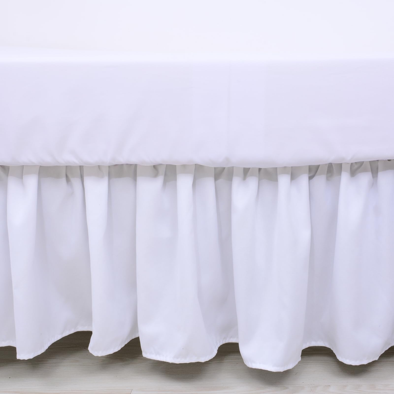 Cloele solid white nursery bedding for calm sleep space