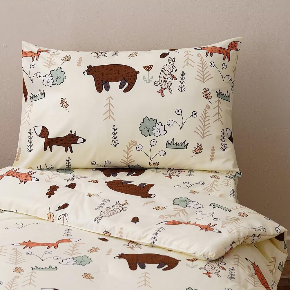CLOTHKNOW four-piece toddler bedding set shown, easy care and complete bed coverage.