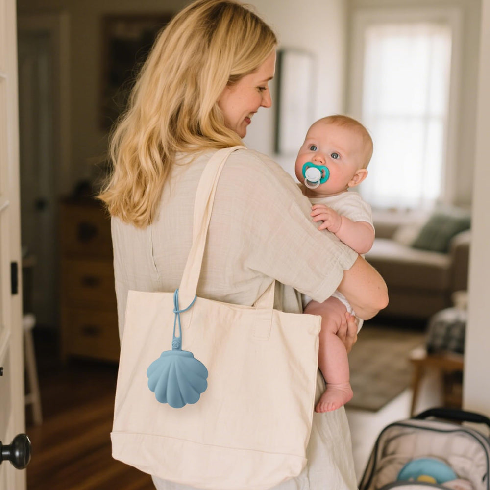 CLYMENE Blossom holds two pacifiers plus small accessories for on-the-go.