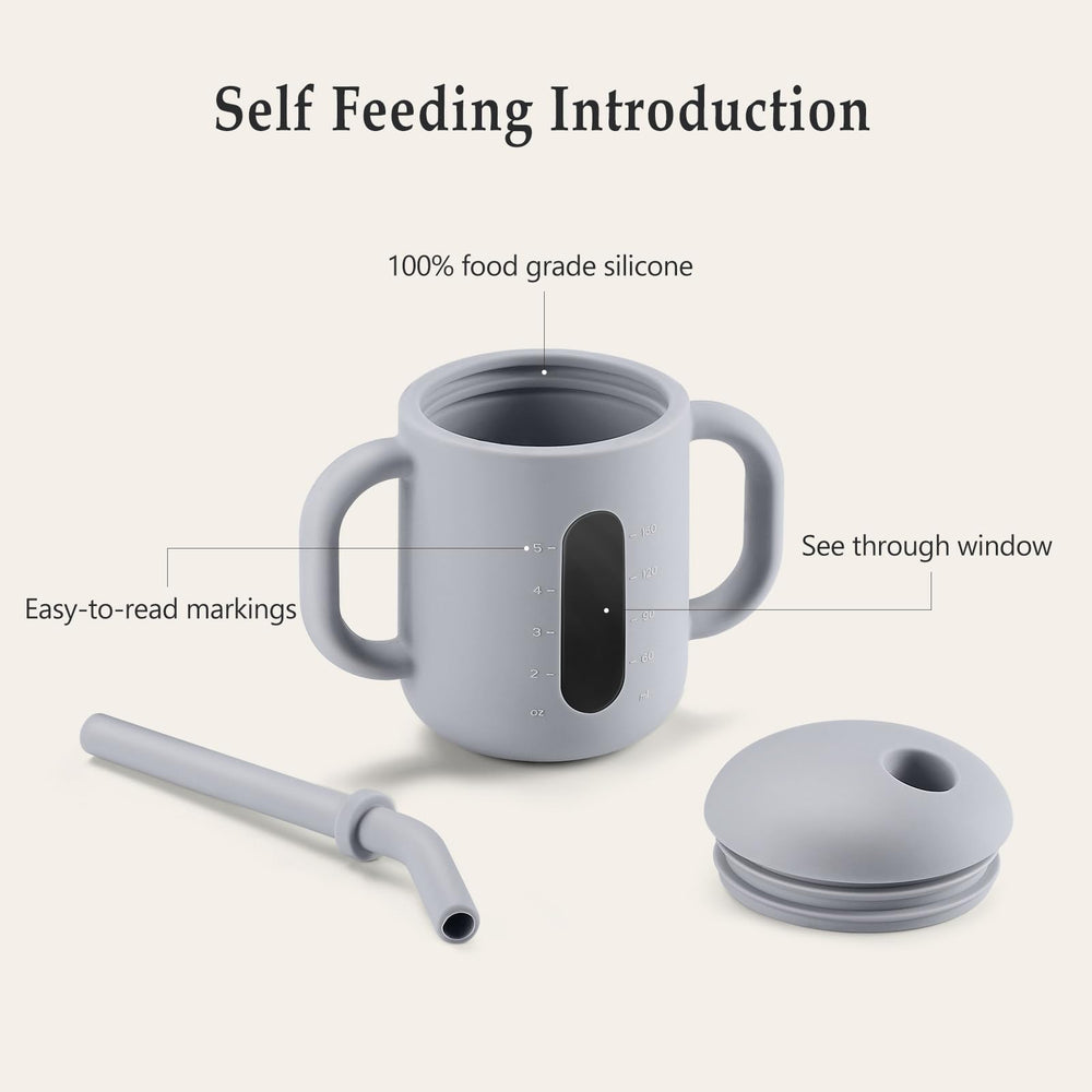 CLYMENE silicone training cup with straw and handles promotes easy gripping for toddlers.