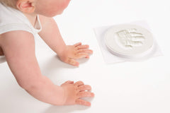 Co Little baby ornament heart highlights delicate footprints for sentimental home display.