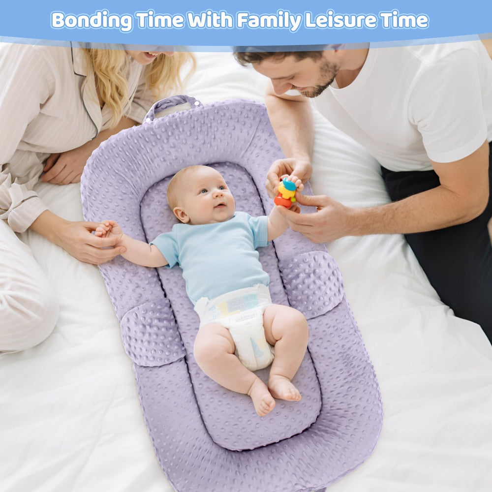 Cococu Baby Lounger used as a changing station in a nursery setting.
