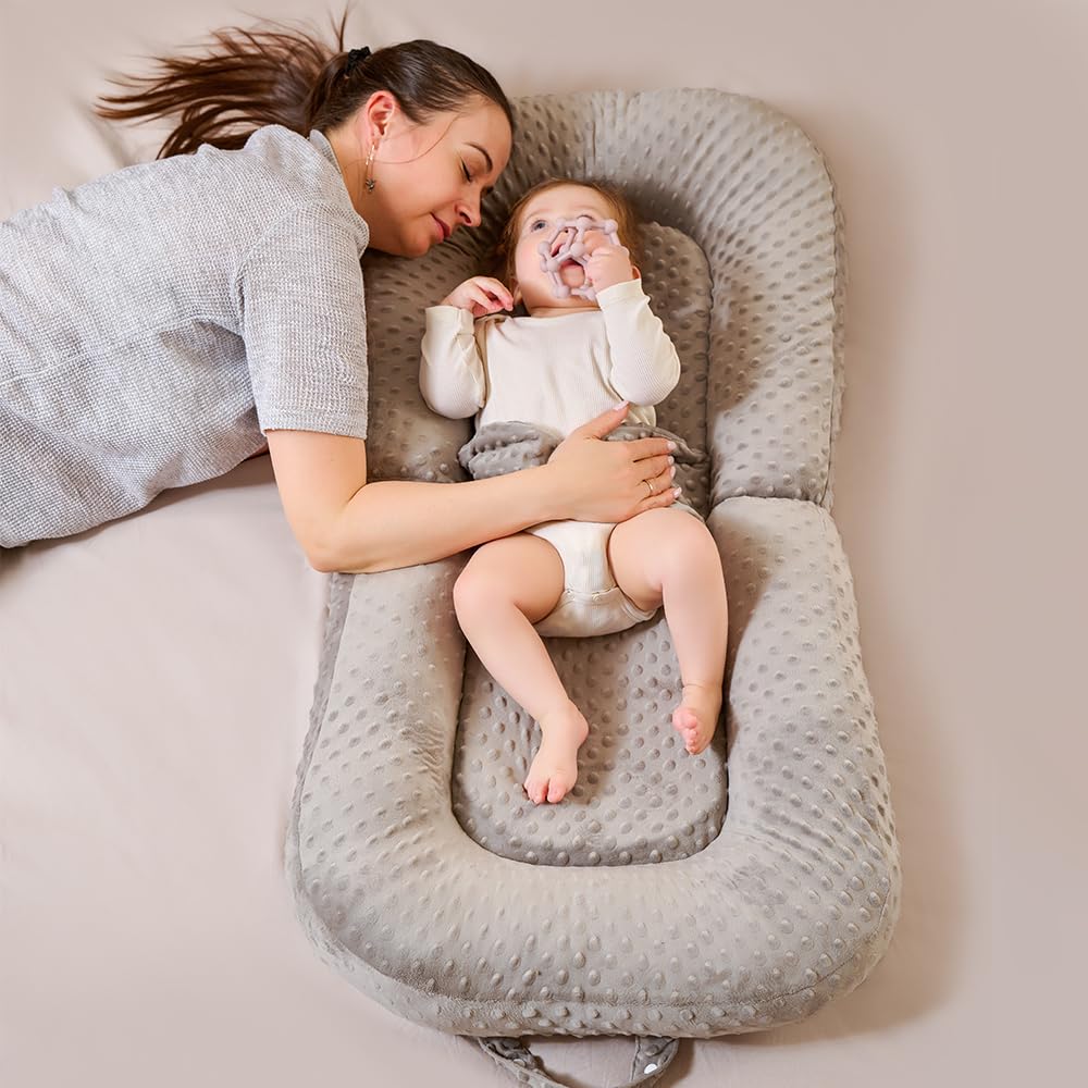 Cococu Baby Lounger Pillow side barriers create secure space for resting and play.