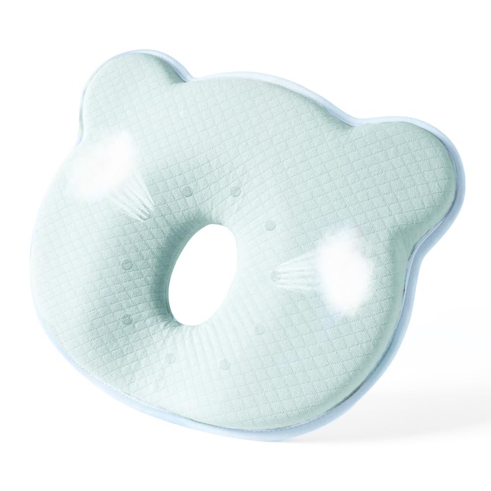 Cococu memory foam baby pillow with newborn head support for nap-time comfort.