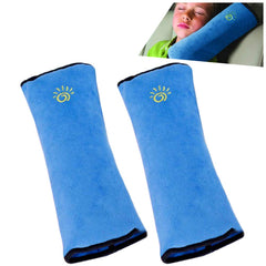 coffled blue seatbelt pillow for kids front view offering soft travel comfort.