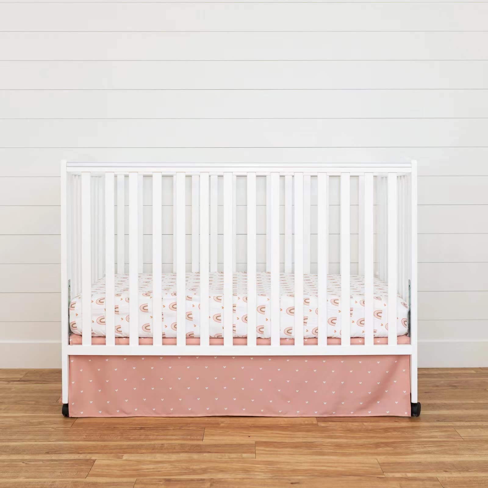 Cokouchyi rainbow sheet pattern adds cheerful boho style to the crib.