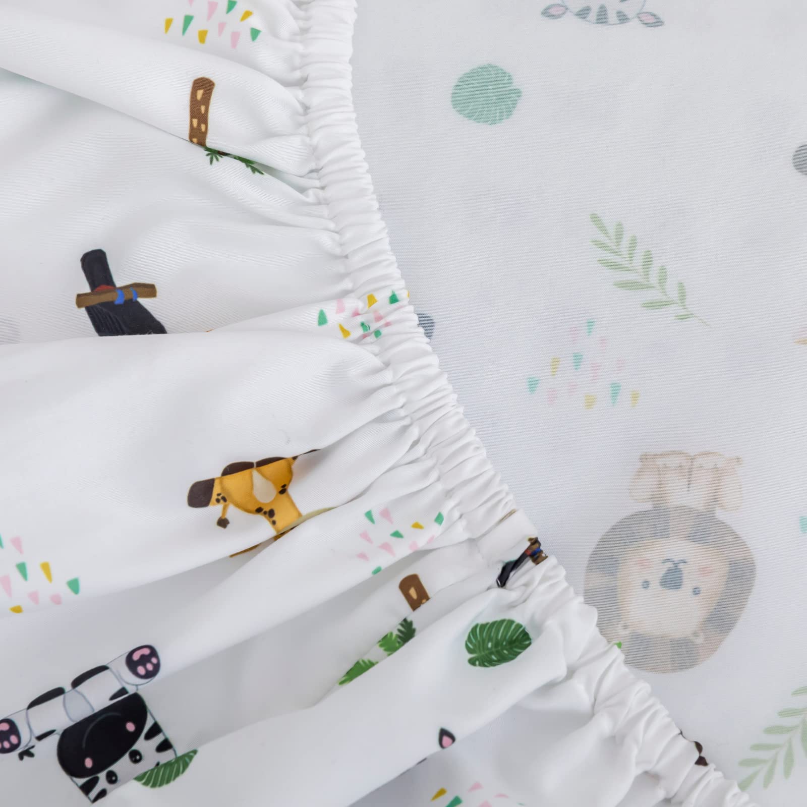 Cokouchyi embroidery detail demonstrates premium stitching on safari animals.