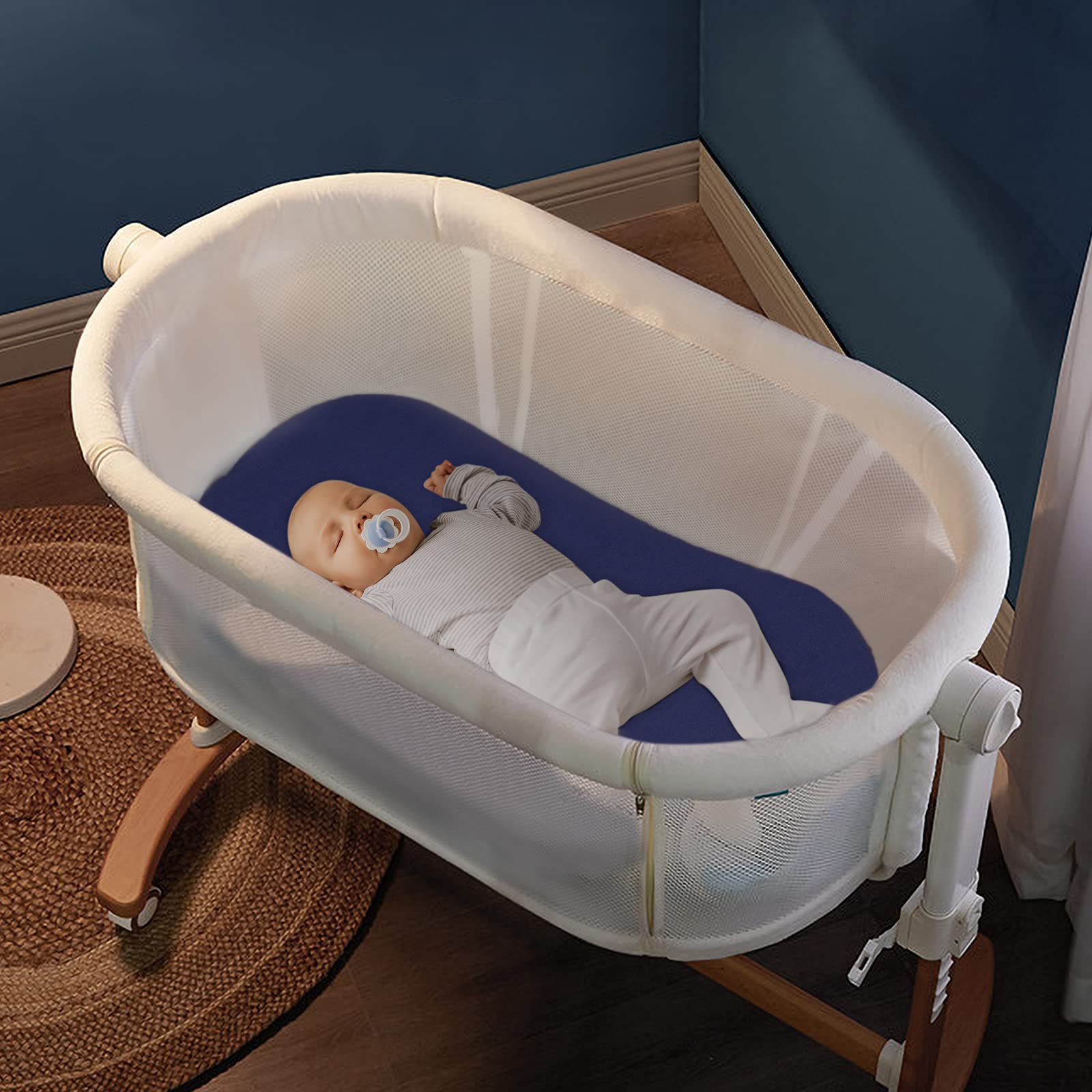 Coldwind grey-navy bassinet sheet set ships neatly and looks ready for nursery