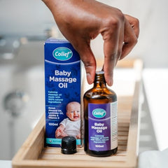 Colief Baby Massage Oil with almond and lavender ingredients for skin nourishment.