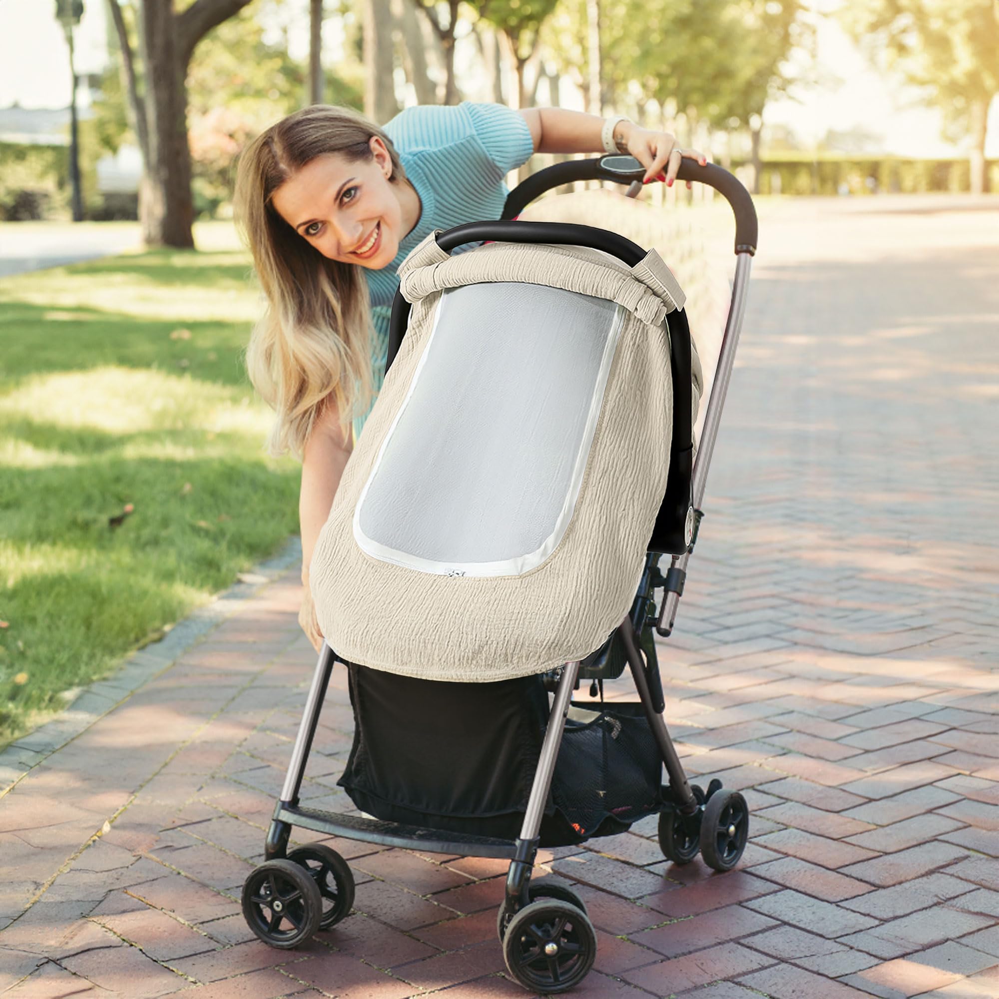 C COMCROSFLY baby carrier cover supports sun and bug protection in outdoor settings.