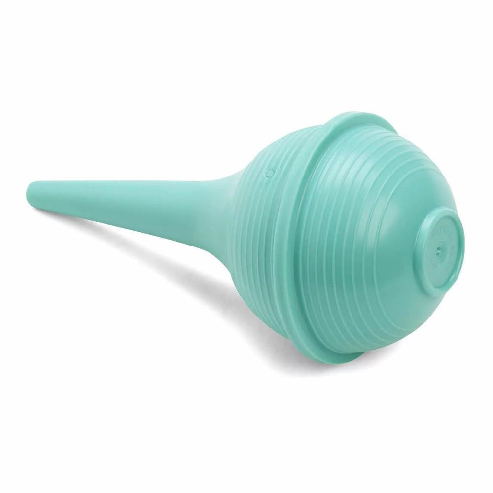 Comfort Axis nasal aspirator in nursery setting supports gentle clearance for babies.