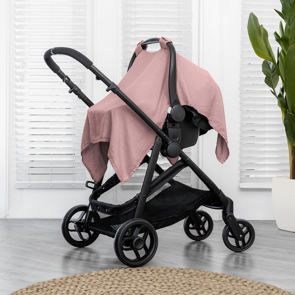 Comfy Cubs car seat cover with secure snap closure for snug, secure fit.