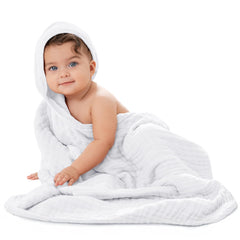 Comfy Cubs baby hooded towel in hooded wrap for snug post-bath warmth.