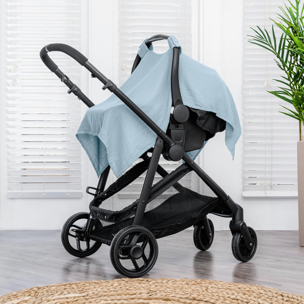Comfy Cubs Baby Seat Cover closeup shows secure snap closure for a snug, dependable fit.