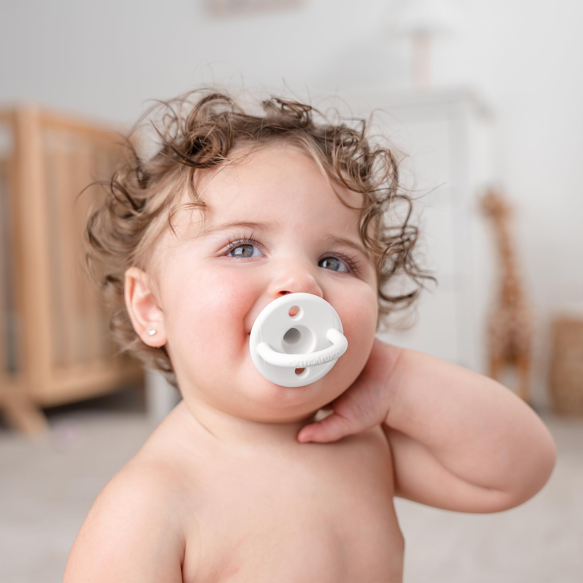 Comfy Cubs silicone pacifier with breast-like nipple for soothing newborns