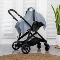 Comfy Cubs car seat cover with secure snap closure keeps it snug on the go