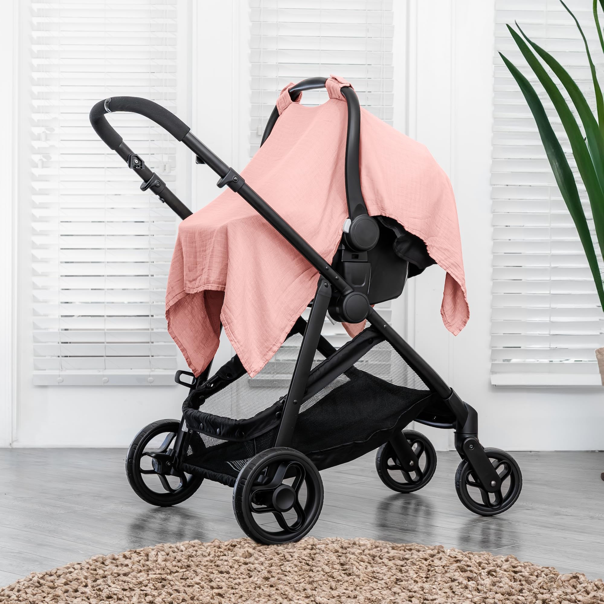 Comfy Cubs car seat cover with snug snap closure demonstrates secure fit for on-the-go use.