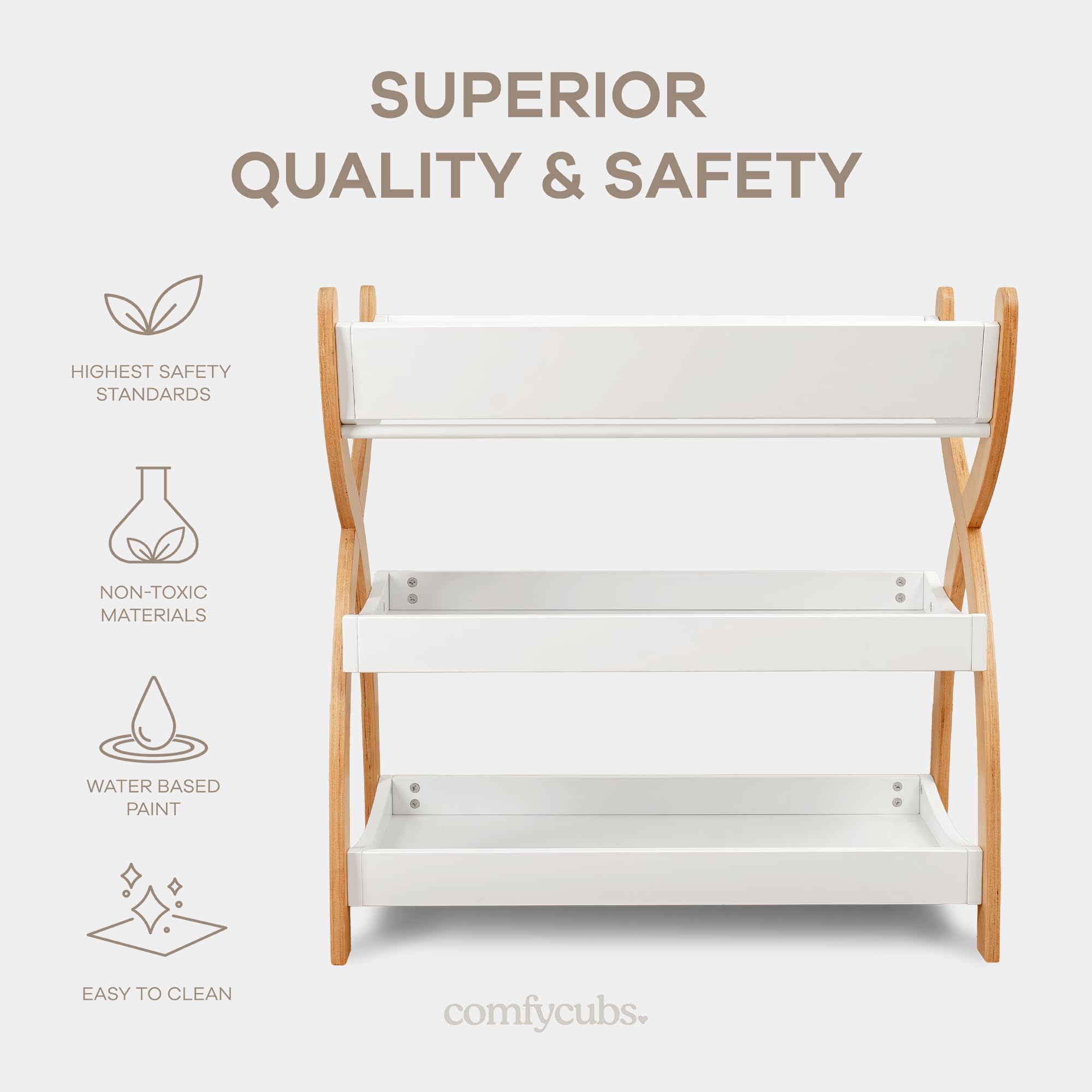 Comfy Cubs changing table white with natural legs demonstrates timeless nursery style.