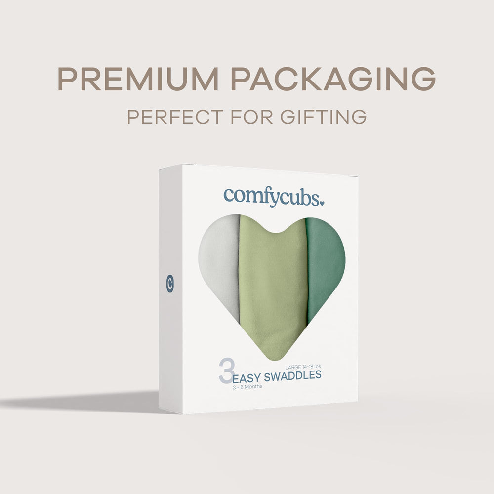 Comfy Cubs Easy Swaddle Azul on baby demonstrates adjustable Velcro secure fit