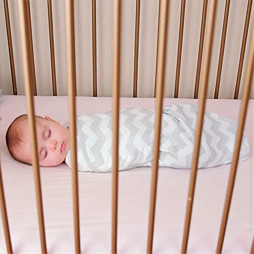 Comfy Cubs Easy Swaddle Blanket in nursery scene shows soft cotton for comfortable sleep.