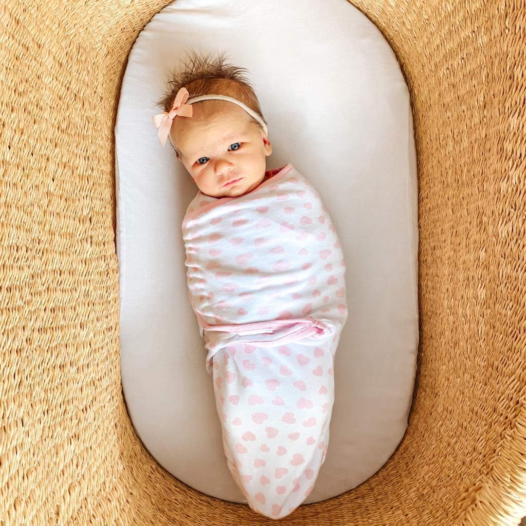 Comfy Cubs Easy Swaddle Blanket side view pink for secure, adjustable swaddling.