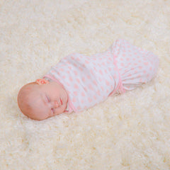 Comfy Cubs swaddle with Velcro tabs close-up demonstrates secure fit.