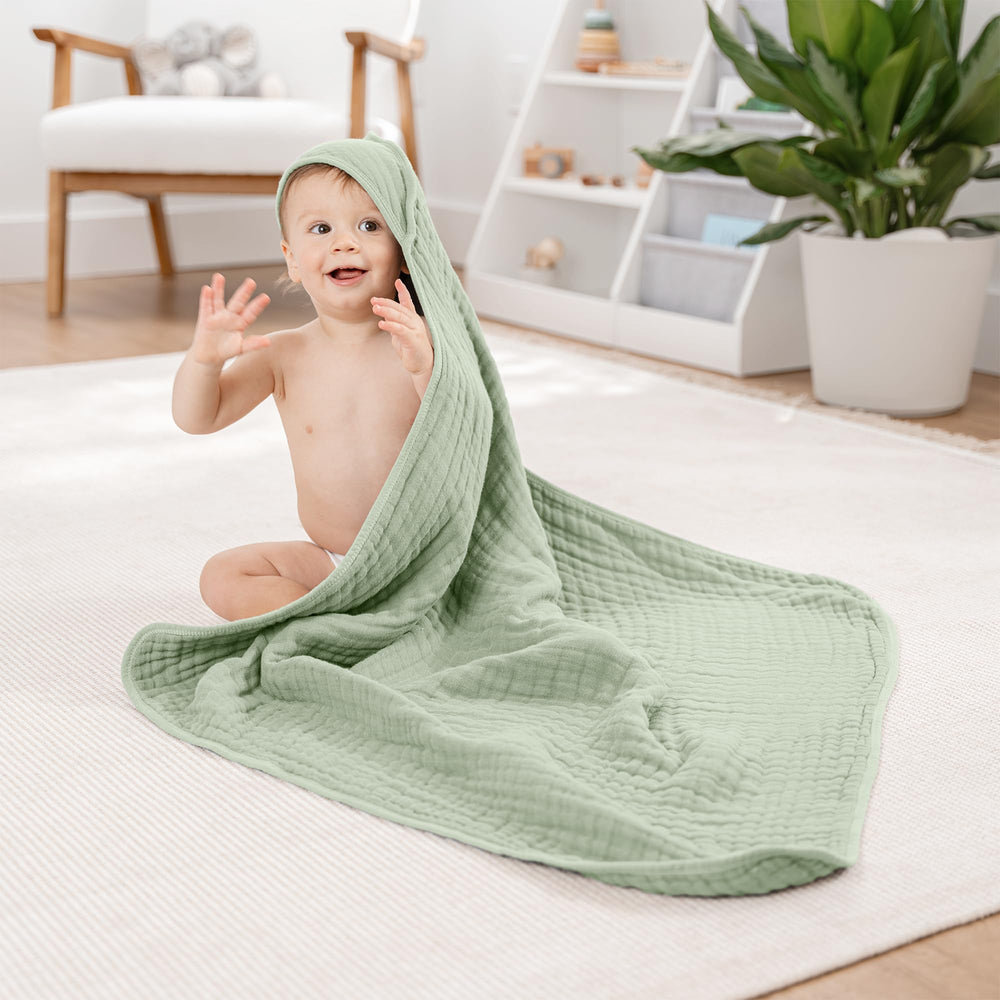 Comfy Cubs hooded towel close-up of 6-layer muslin texture for durability.