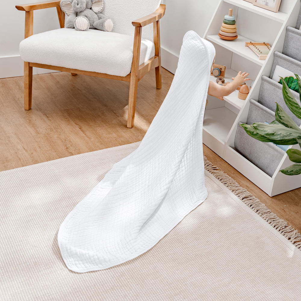 Comfy Cubs hooded towel wrapped baby drying softly after bath